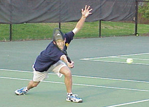 Captain Elsworth lunges for a volley.