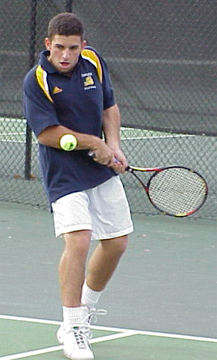 Andrew Jacobi '01 lines up a backhand.