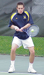 Julian Baccash '02 returns serve on the backhand wing.