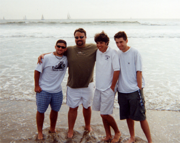 Andrew Jacobi '01, coach Ned Gallagher, Jeremy Van Fleet '01, and captain James Elsworth '01.