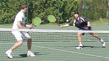 Mark Goldberg '03 watches as partner Karl Blunden '04 volleys in a #2 doubles match.