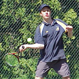 Karl Blunden '04 hitting a forehand drive.